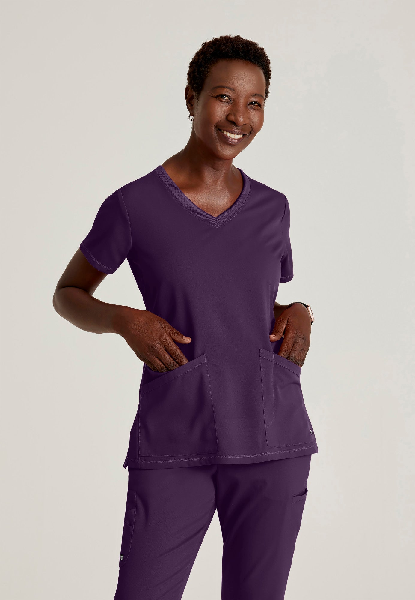 Serena Top - Eggplant | Grey's Anatomy Scrubs